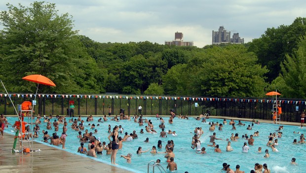 The sun is up and so are the lifeguard umbrellas at Van Cortlandt Pool.