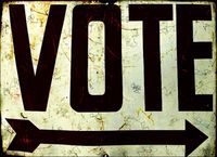 vote sign with arrow