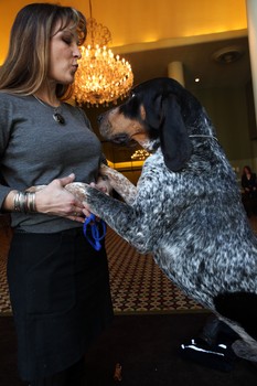 Susan Lloyd dances with her bluetick coonhound Mike.