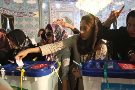 An Iranian woman casts her vote at a polling station in Iran in June 2009