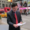 Times Square, Taxi and Limousine Commissioner David Yassky reads a poem he wrote in honor of the literary partnership between subways and cabs.