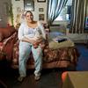 Lissette Encarnacion in her apartment at The Brook, a supportive housing complex in the Bronx