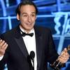 Alexandre Desplat accepts the Oscar for 'The Grand Budapest Hotel' 