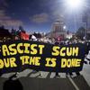 Protesters against racism march through Oakland, Calif., Saturday, Aug. 12, 2017. 