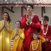 Canadian Prime Minister Justin Trudeau and his family greet media in an Indian style of 'Namasteas' in Ahmadabad, India, Monday, Feb. 19, 2018.