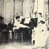 Claude Debussy at the piano in front of the composer Ernest Chausson in 1893.