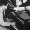 Gershwin performing 'I Got Rhythm' in 1931 at Manhattan Theater.
