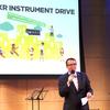 WQXR general manager Graham Parker speaking about the WQXR Instrument Drive in the Greene Space.