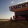 A worker at Lucky Leo's arcade in Seaside Heights, NJ, digs out more than 2 months after Sandy.