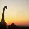 Jorge Saenz uses a small herd of plastic dinosaurs to enhance his travel photos