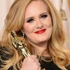 Singer Adele, winner of the Best Original Song award for 'Skyfall,' poses in the press room during the Oscars.