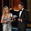 Amy Poehler and host Seth Meyers  onstage at the 66th Annual Primetime Emmy Awards