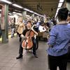 Cellist Dale Henderson, founder of Bach in the Subways Day, plays in the Times Square subway on March 21, 2012.
