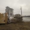 Living on the water in Broad Channel, Queens means repairing your private gangway to get to shore from your house after Sandy. coastcheck
