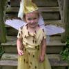 Girl in a princess costume covered in cicadas