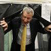 Bill de Blasio emerges from a voting booth on Sept. 10