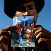 Guatemalan Francisco Ramos shows a picture of his son Gilberto Francisco Ramos, a 15-year-old boy who died in the Rio Grande Valley in Texas, while trying to reach the United States on his own.