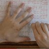This music video for Gordon Hamilton's 'Who We Are' features hands writing the score in time with the music.