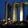 Greek national opera singers perform at the archaeological site of the Olympion Zeus in Athens on July 8, 2014