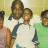 Robert Wayne Holsey during a death row visit with nieces and a nephew