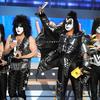 Musicians Eric Singer, Paul Stanley, Gene Simmons and Tommy Thayer of KISS speak at the Academy Of Country Music Awards in 2012