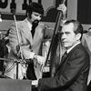 President Richard Nixon plays the piano during the dedication of the Grand Ole Opry in 1974.