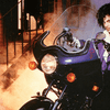 Prince, from the cover of his 1984 album 'Purple Rain'