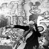 Mstislav Rostropovich performs in front of the crumbling Berlin Wall in Nov. 1989