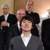 South Korean pianist Seong-Jin Cho, winner of 17th International Chopin Piano Competition stands with members of the jury