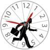 A business man races against time in the rat race as he runs in a hamster wheel clock.