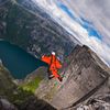 A B.A.S.E. jumper in wingsuit jumps off a cliff August 21, 2010, in Kjerag, Norway. Wingsuit cliff jumping is an advanced discipline, it makes human flight possible. 
