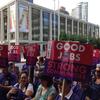 Members of the service workers' union 32BJ gathered outside Lincoln Center Thursday to protest proposed benefit cuts
