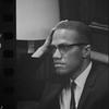 Malcolm X waits at Martin Luther King press conference