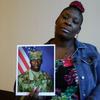  In this Nov. 27, 2018, file frame from video, April Pipkins holds a photograph of her deceased son, Emantic 'EJ' Bradford Jr., during an interview in Birmingham, Ala