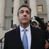 Michael Cohen walks out of federal court, Thursday, Nov. 29, 2018, in New York, after pleading guilty to lying to Congress about work he did on an aborted project to build a Trump Tower in Russia