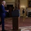 Biden walks to microphone