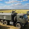A Russian soldier atop of a military truck with the letter Z, which has become a symbol of the Russian military, in a wheat field not far from Melitopol, south Ukraine, Thursday, July 14, 2022. 