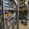 Pharmaceutical items are kept locked in a glass cabinet at a Gristedes supermarket in New York. Increasingly, retailers are locking up more products or increasing the number of