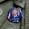 The button that Danny Chen's mother, Su Zhen Chen, keeps on her purse in memory of her son.