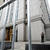 A court officer stands guard outside Federal Court on Oct. 6, 2012 in New York after terror suspect radical Islamist pracher Abu Hamza al-Masri appeared before US Judge Frank Maas.
