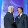 Former President Bill Clinton greets Republican presidential candidate Mitt Romney at the Annual Meeting of the Clinton Global Initiative.