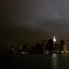 NYC skyline with lower Manhattan in darkness