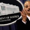 U.S. Attorney General Eric Holder holds a news conference with other officials from the Financial Fraud Enforcement Task Force to announce the results to date of 'Operation Broken Trust.'