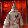 This February 25, 2011 video image shows the image of an African American man behind a Ku Klux Klan (KKK) robe on exibit as part of the 'American I AM: The African Imprint' at the National Geographic 