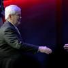 Republican presidential candidate, former Speaker of the House Newt Gingrich reaches to shake hands during a campaign stop at the Cathedral of Praise on January 15, 2012 in Charleston, South Carolina.