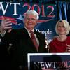 Republican presidential candidate, former Speaker of the House Newt Gingrich (L) speaks during a primary night rally with his wife Callista Gingrich January 21, 2012 in Columbia, South Carolina. With 