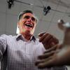 Republican presidential hopeful Mitt Romney greets supporters as he holds a campaign rally at Emma Lou Olson Civic Center in Pompano Beach, Florida, January 29, 2012.