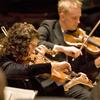 Violinists Dale Barltrop and Daria T. Adams of the St. Paul Chamber Orchestra