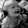 baby with headphones listening to music