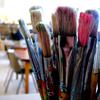 Paintbrushes in a classroom.